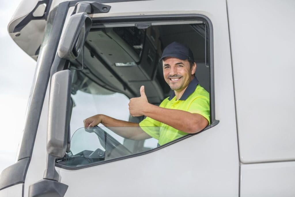 Driver is happy while doing thumbs up gesture